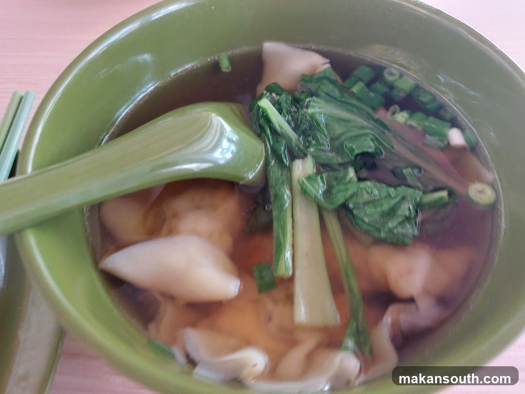 Bowl of Wonton Soup with Greens