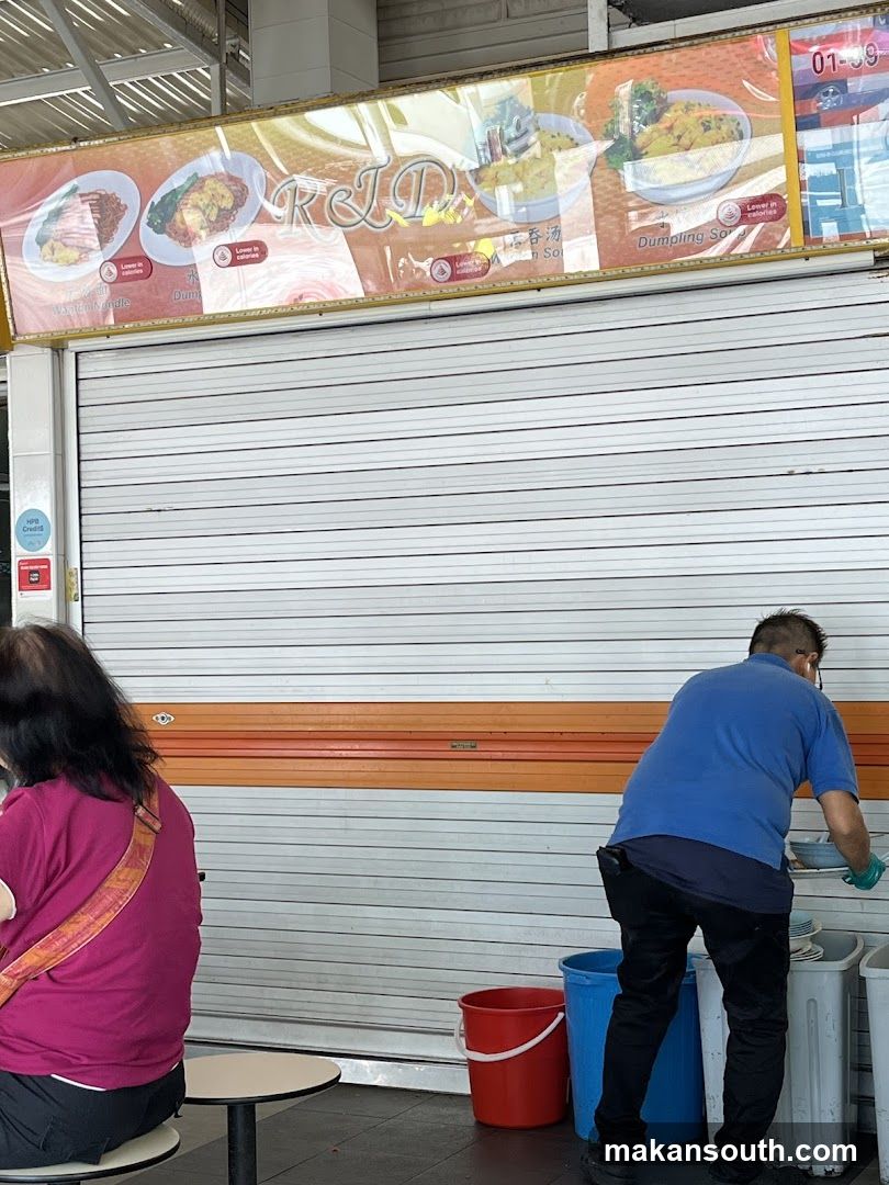 Food stall with closed shutter