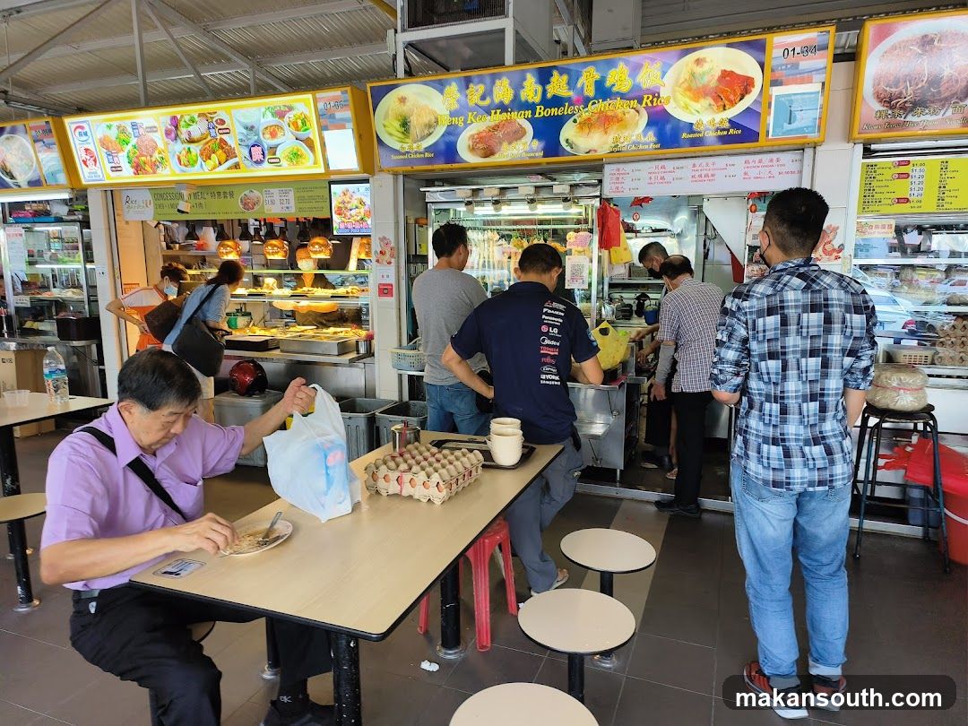 Food Stall Interior with Customers Eating and Ordering