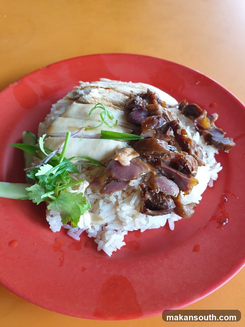 Plate of Chicken Rice with Pickled Vegetables