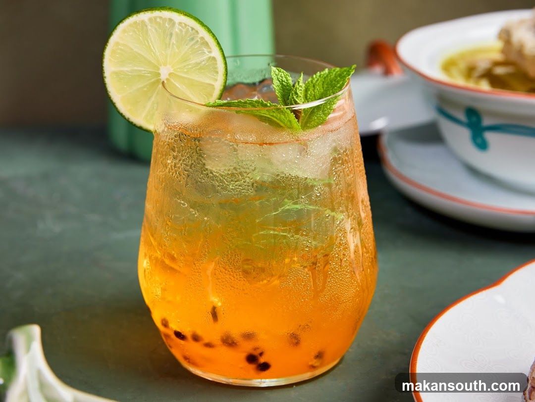 Beverage with Lime and Mint Garnish