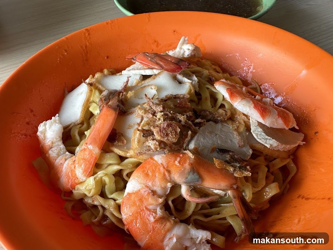 Shrimp Noodles with Fried Onions and Fish Cakes