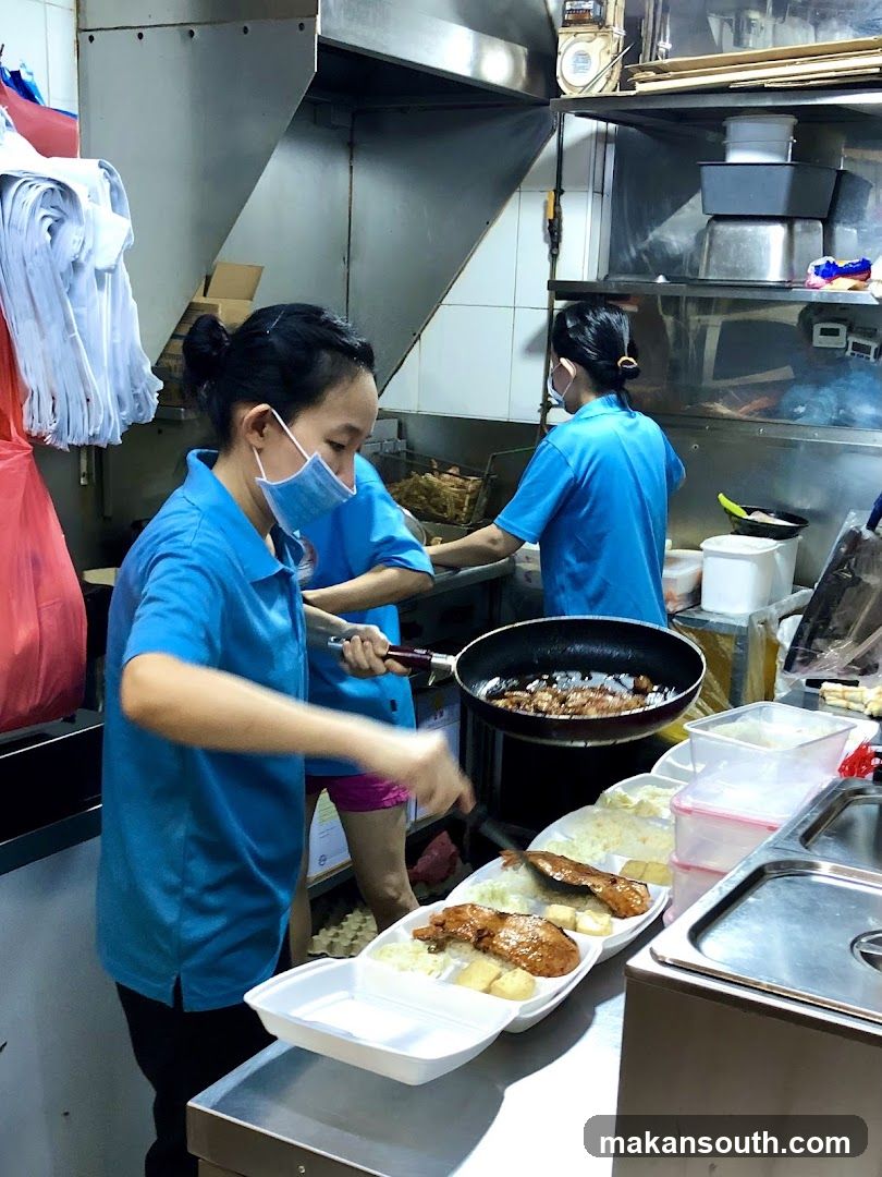 Kitchen Staff Preparing Food