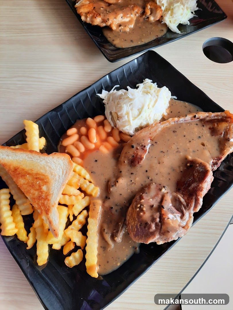 Pork Chop Meal with Fries and Baked Beans
