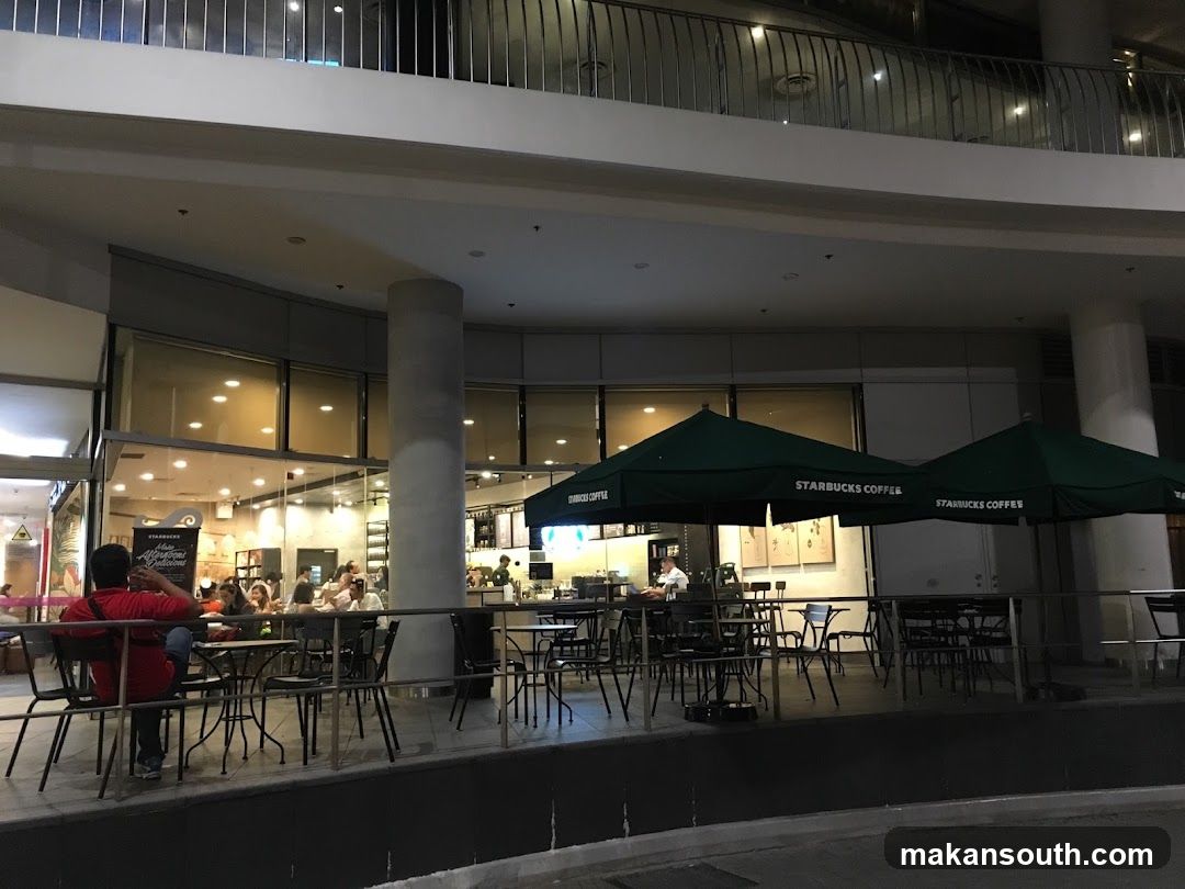 Starbucks Outdoor Seating Area at Night