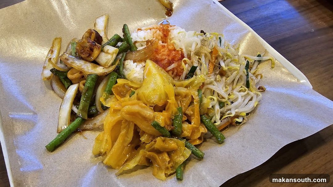 Korean-style rice bowl with vegetables and kimchi