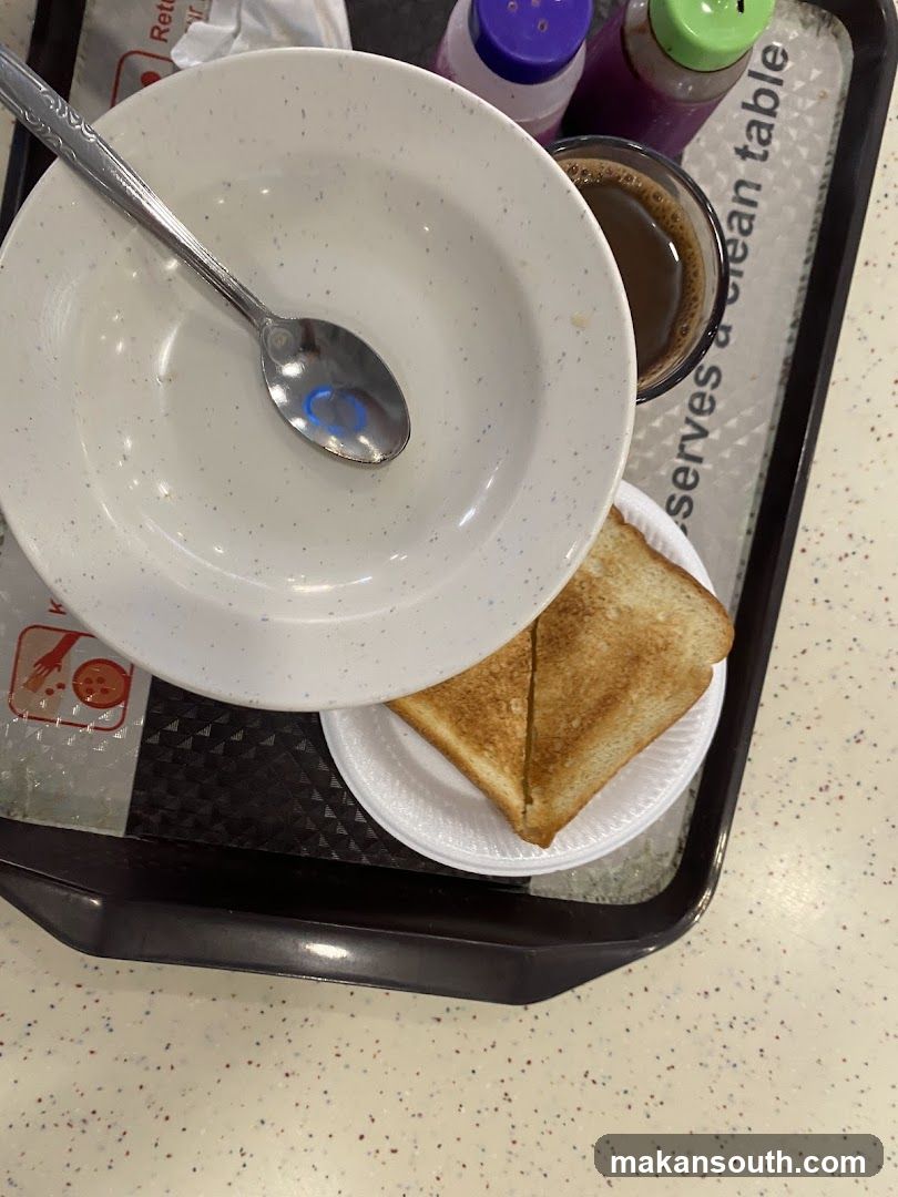 Food tray with toast and coffee