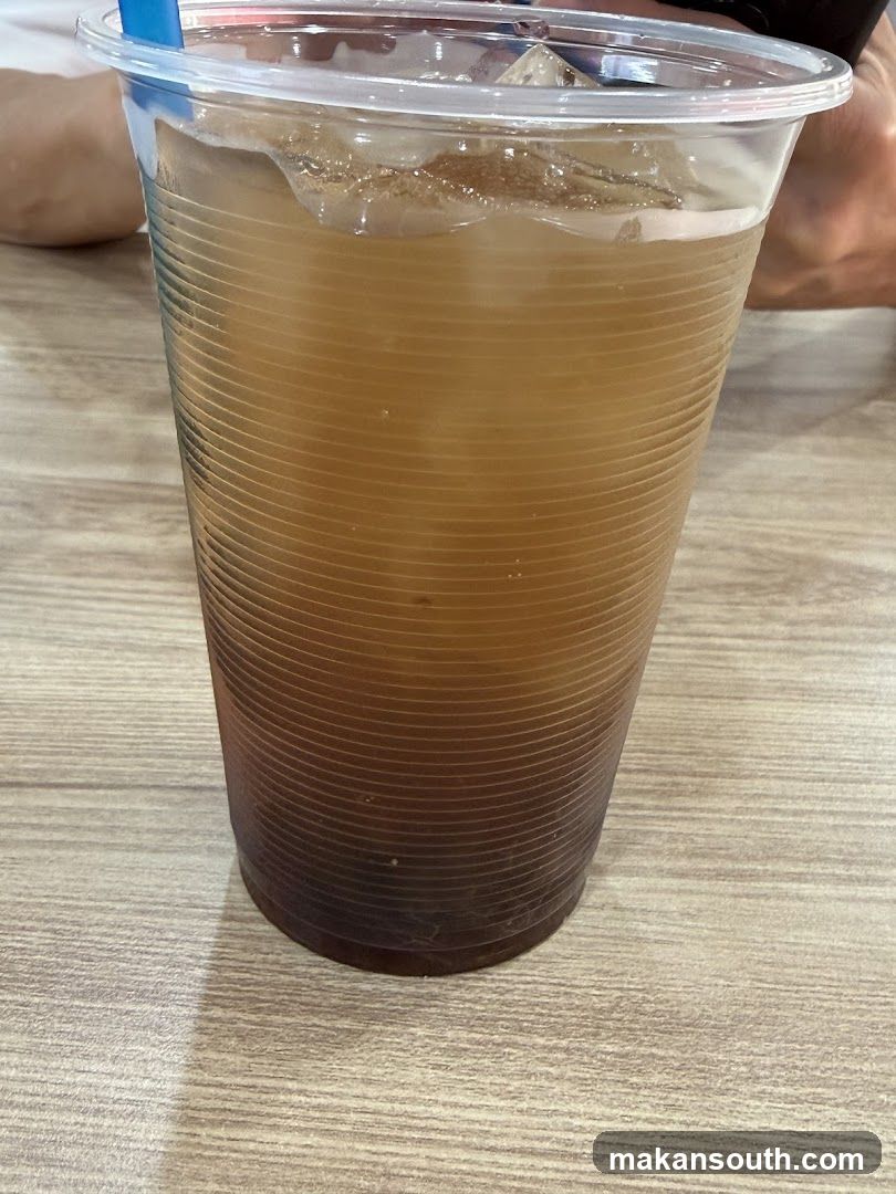 Iced beverage in plastic cup