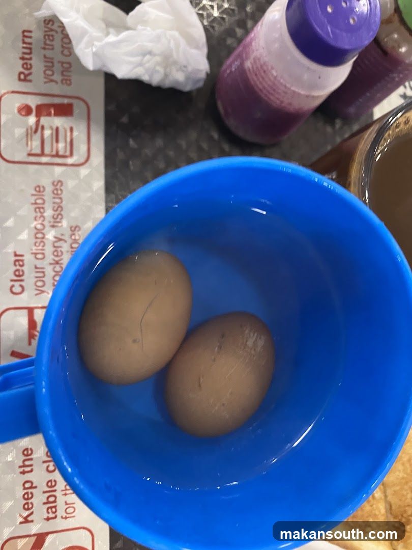 Table Setting with Eggs in Blue Cup