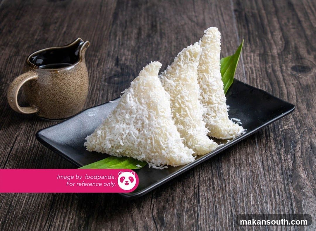 Coconut-covered dessert triangles with dipping sauce