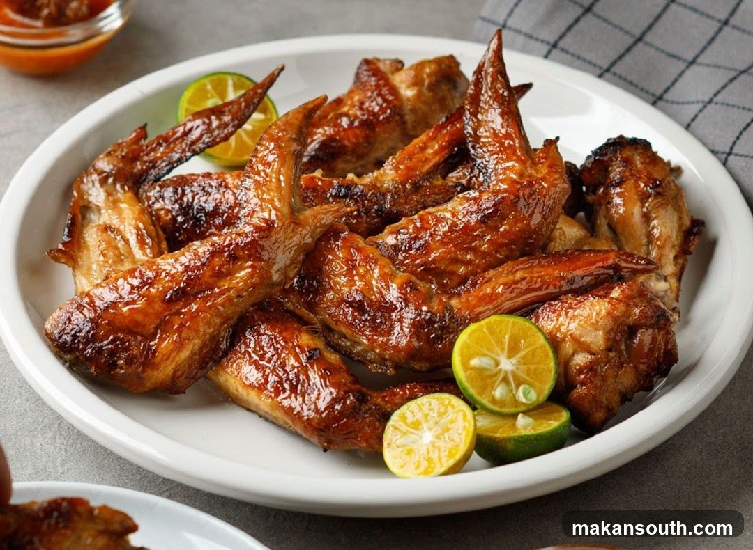 Grilled Chicken Wings with Lime Garnish