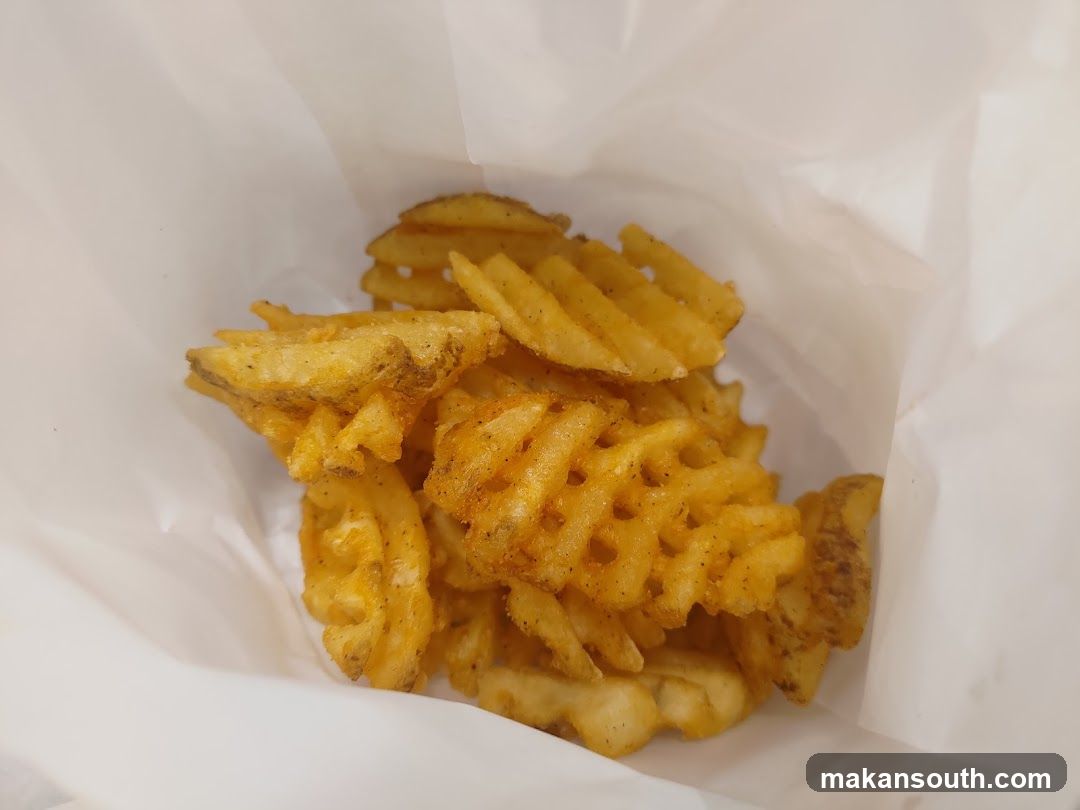 Waffle Fries in Paper Bag
