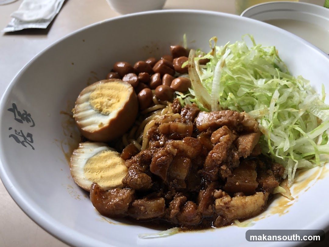 Bowl of Braised Pork Noodles with Egg and Cabbage