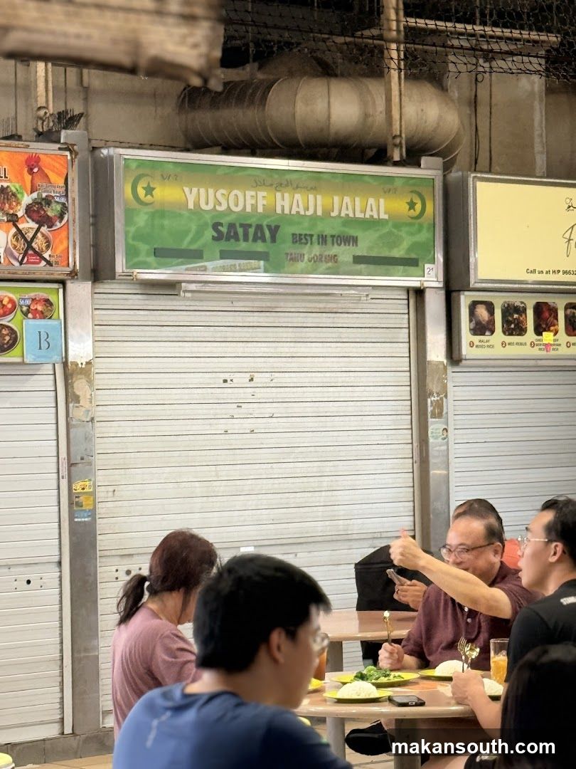 Satay Stall Exterior with Diners