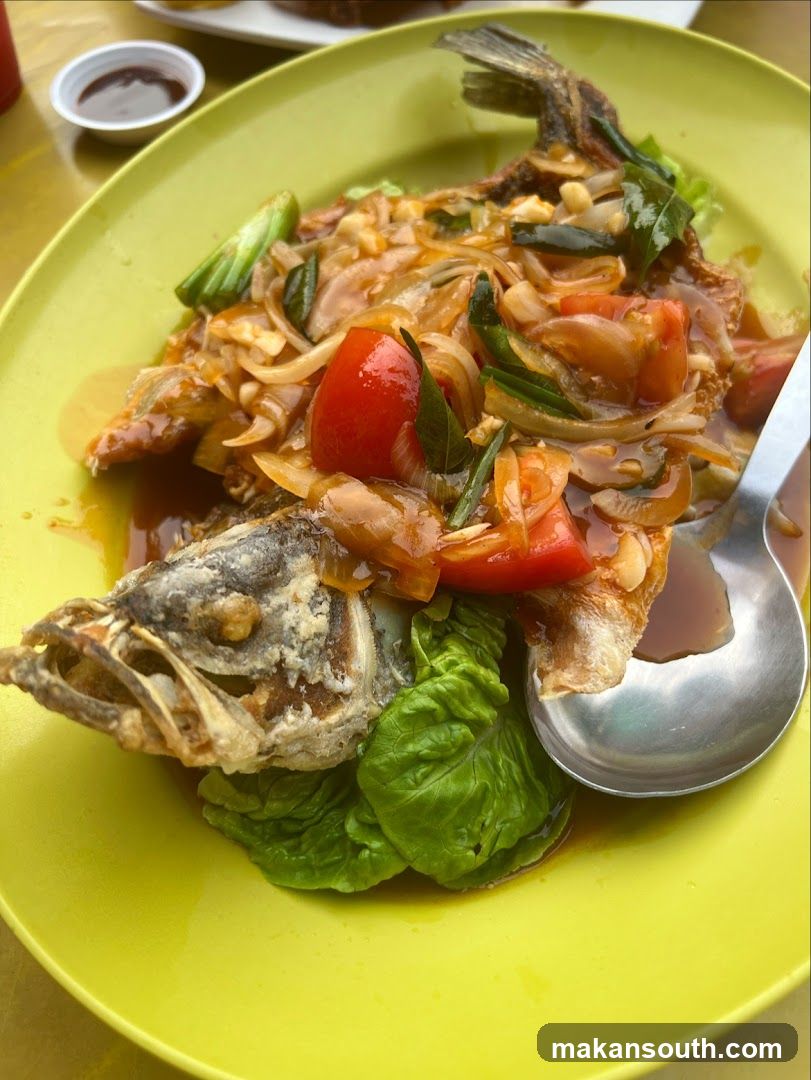 Fried Fish with Tomato and Onion Sauce