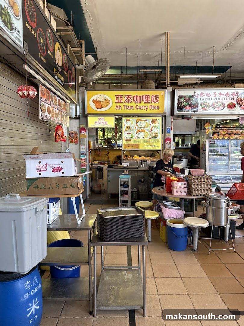 Food Stall Interior with Signage and Equipment