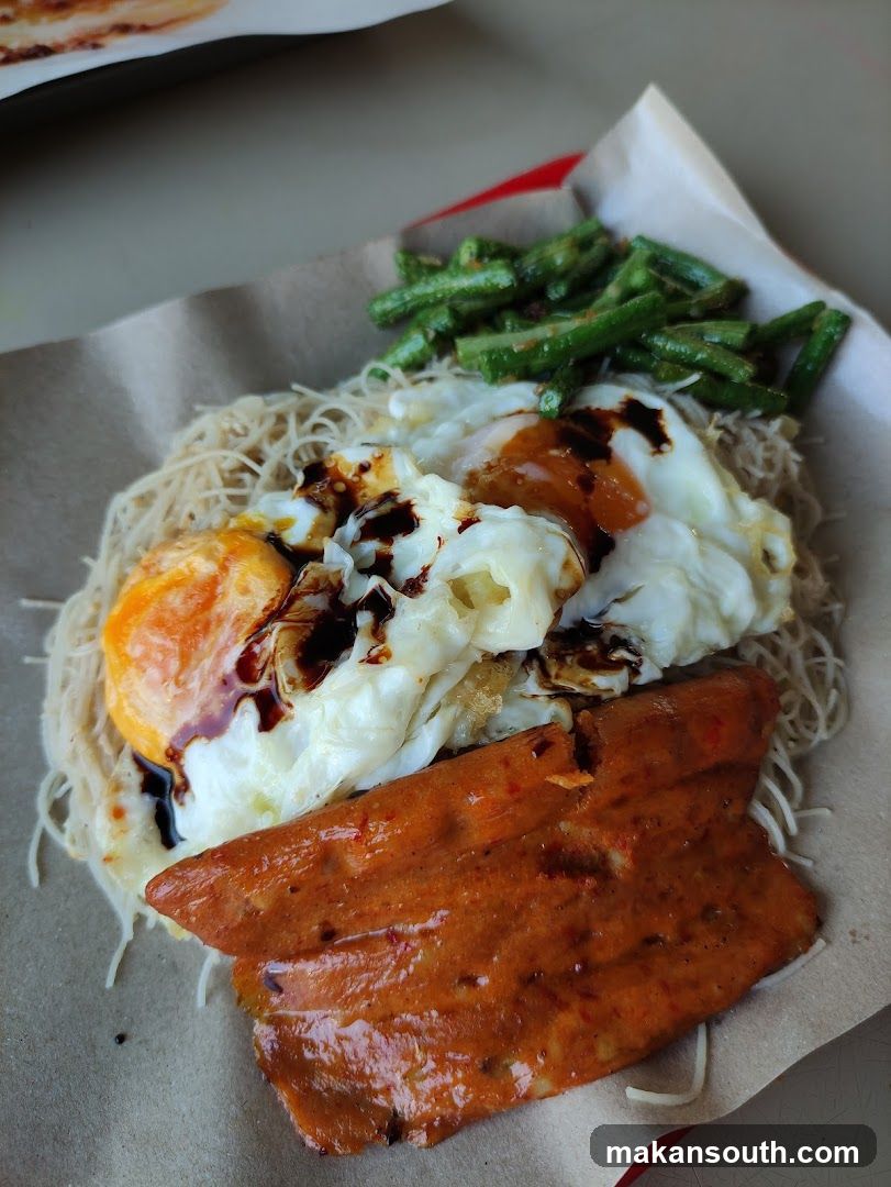 Noodle Dish with Fried Egg and Green Beans