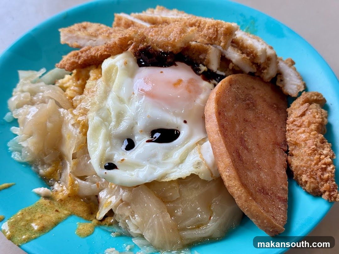 Fried Rice with Fried Egg and Crispy Pork