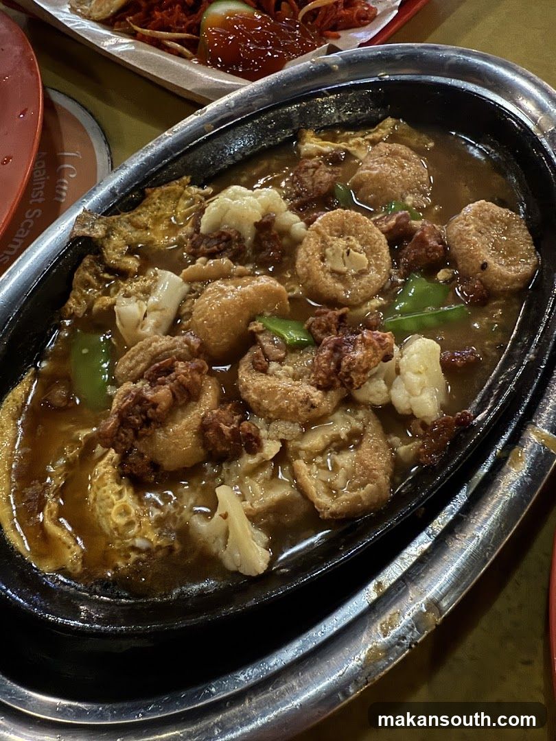 Sizzling Dish with Fries and Vegetables