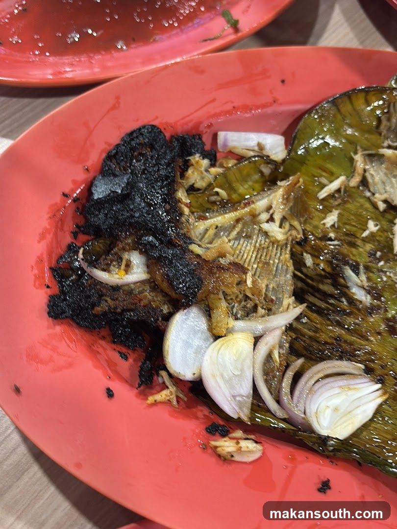 Grilled Fish with Banana Leaf and Onions