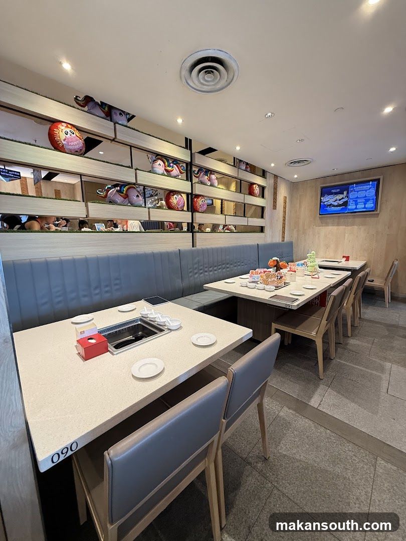 Restaurant Interior with Booth Seating and Decorative Wall Shelves