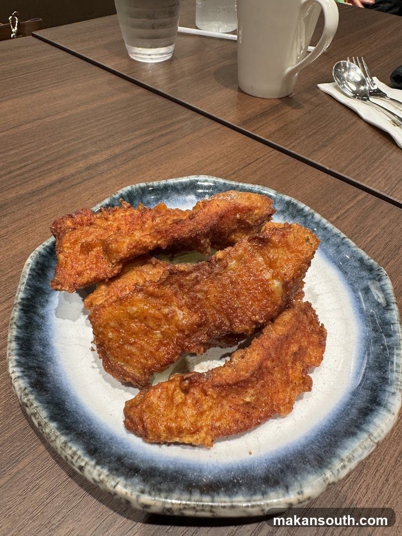 Fried Fish Fillets on a Plate