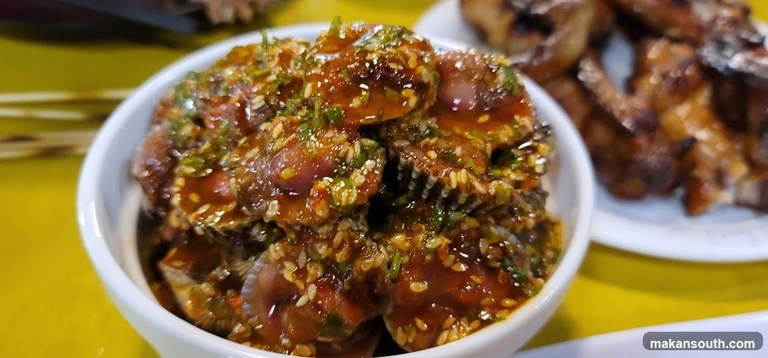 Savory Shellfish Dish with Sesame and Herb Sauce