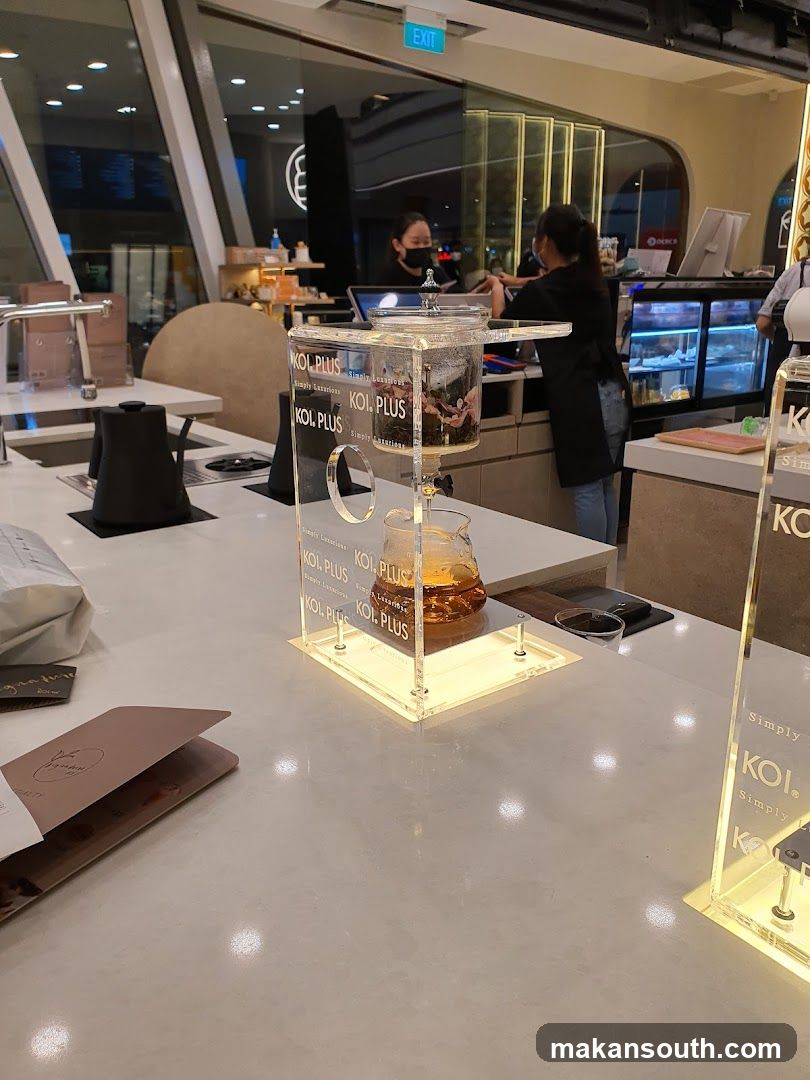 Coffee Shop Interior with Koi Plus Display