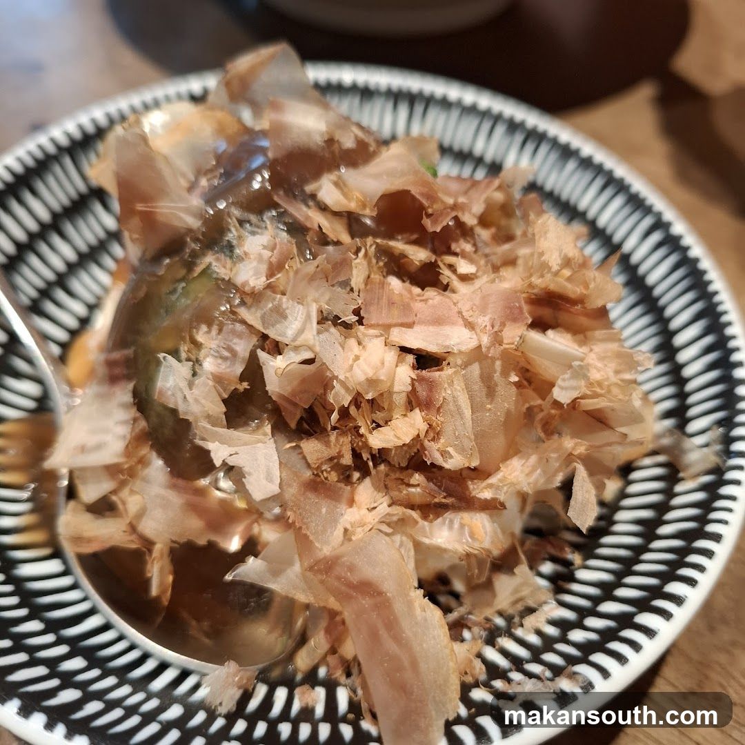 Bowl of food with bonito flakes