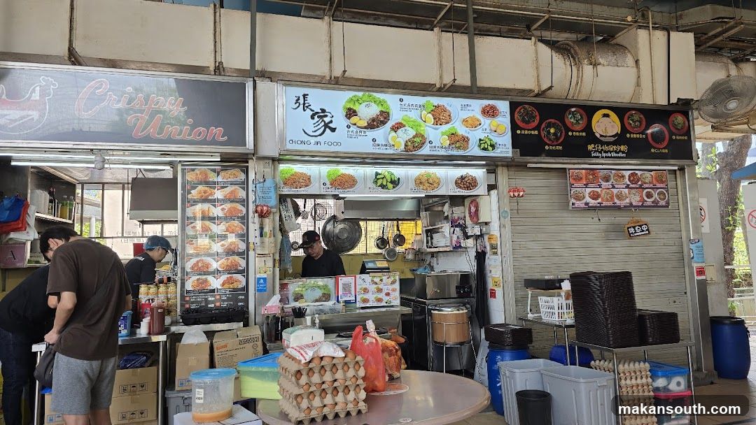 Food Stall Exterior with Staff and Customers