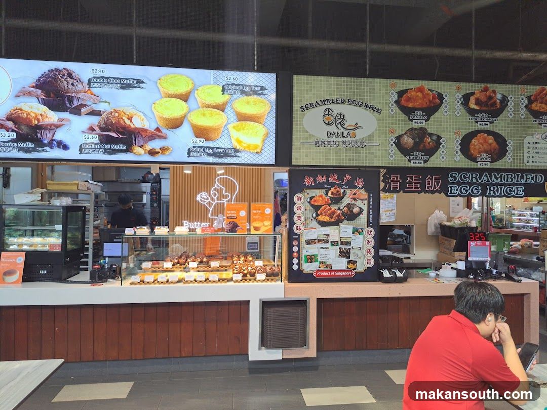 Food Stall Interior with Menu Boards and Customer