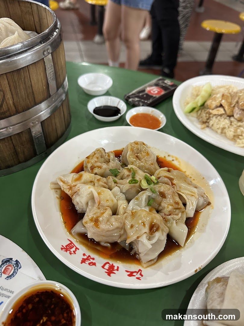 Dumplings and Rice Dish at Restaurant Table