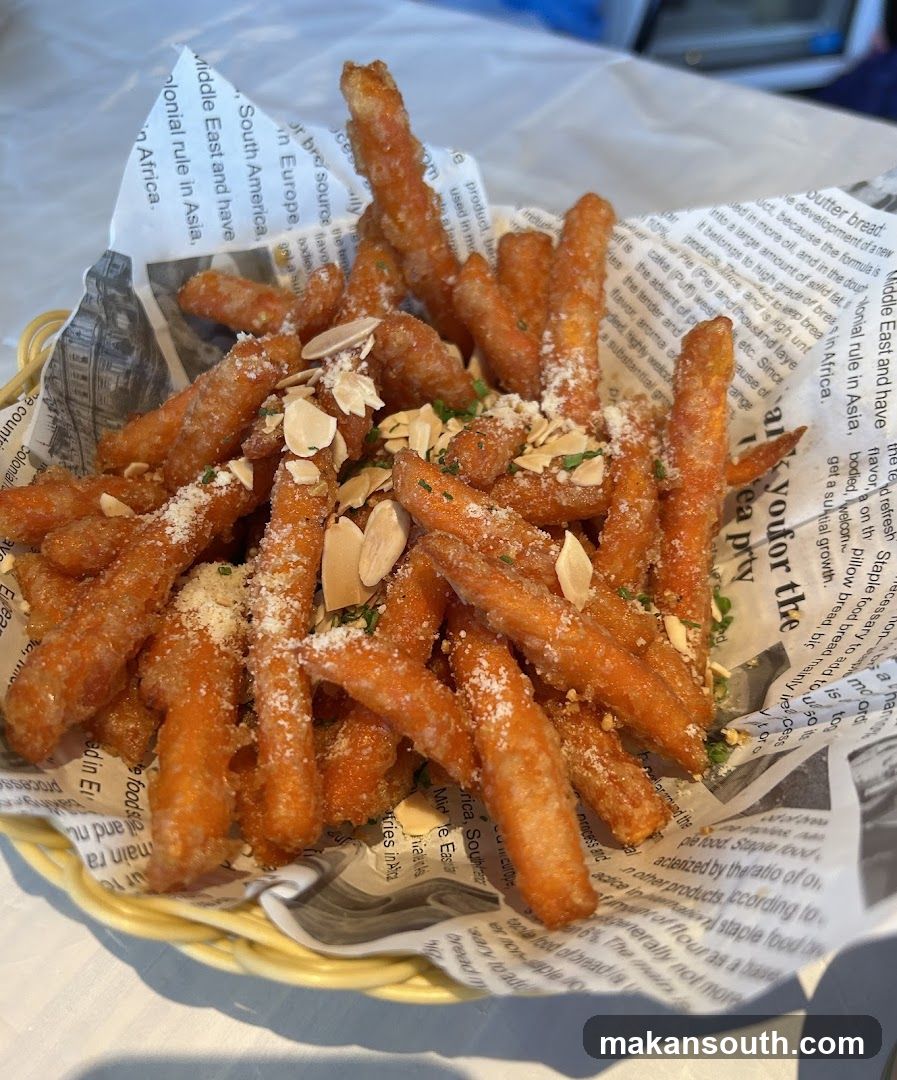 Fried Sweet Potato Fries with Almonds and Seasoning