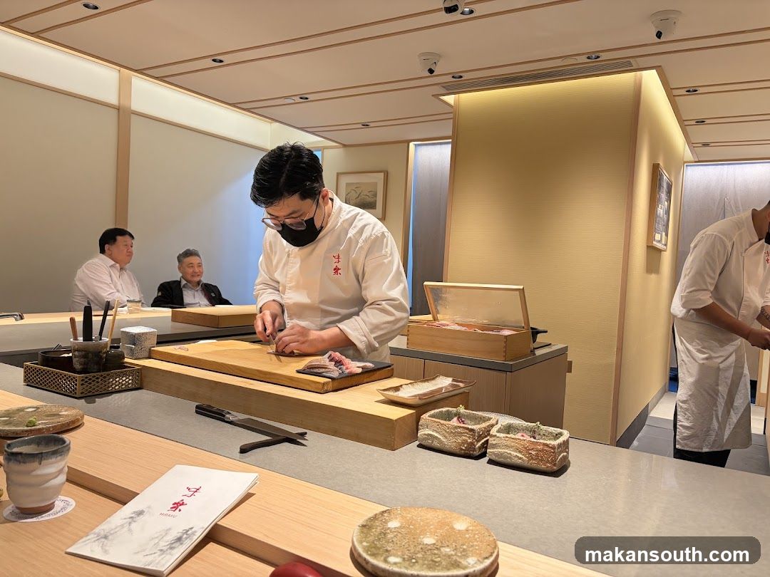 Sushi Chef Preparing Food