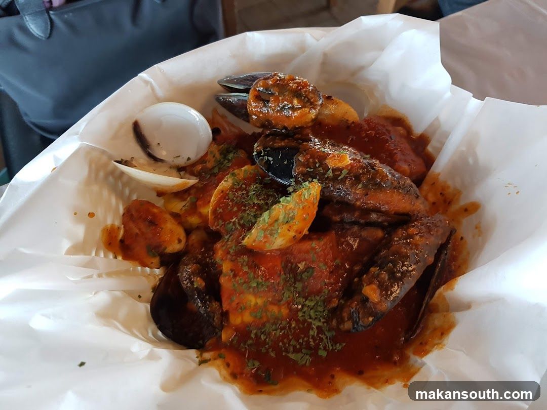 Seafood Dish in Paper Bowl