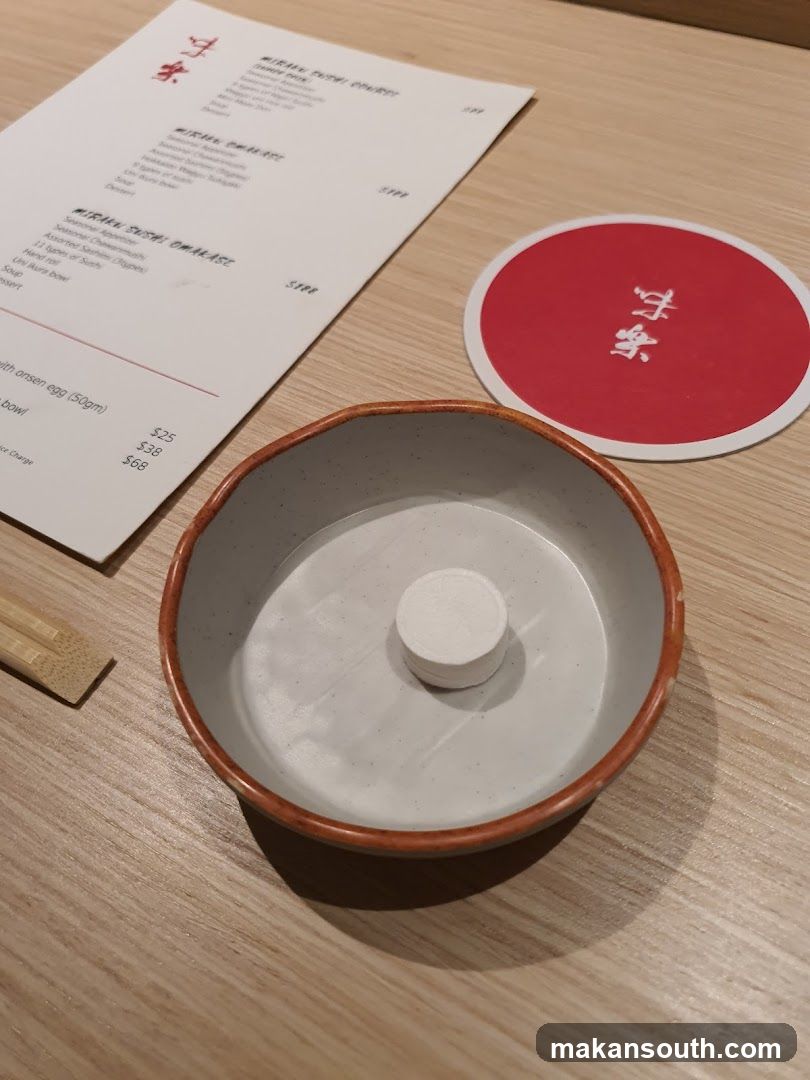 Bowl with egg on table
