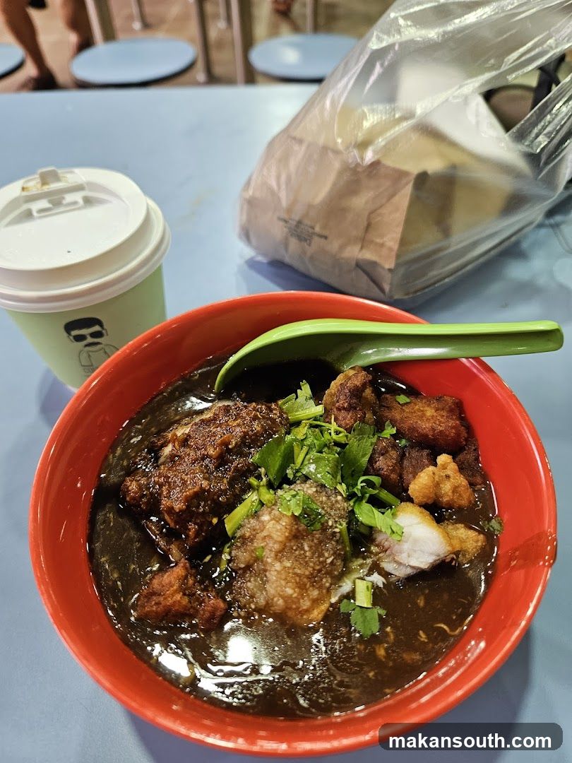 Bowl of Dark Broth with Fried Items