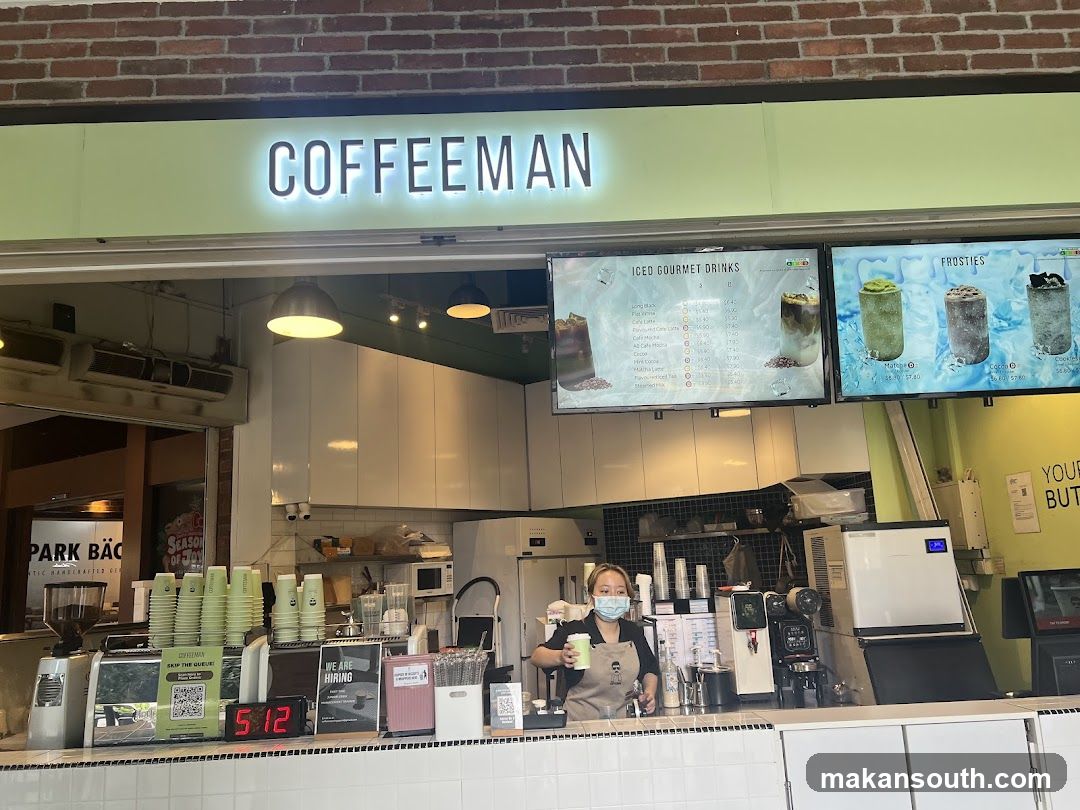 Coffee Shop Interior with Staff and Menu Boards