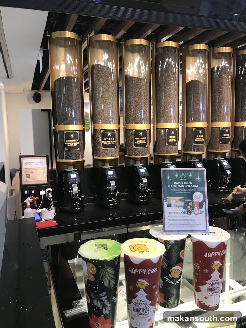 Coffee Shop Interior with Bean Silos and Holiday Cups