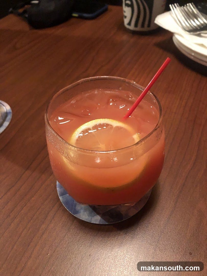 Pink Cocktail with Lemon Slice