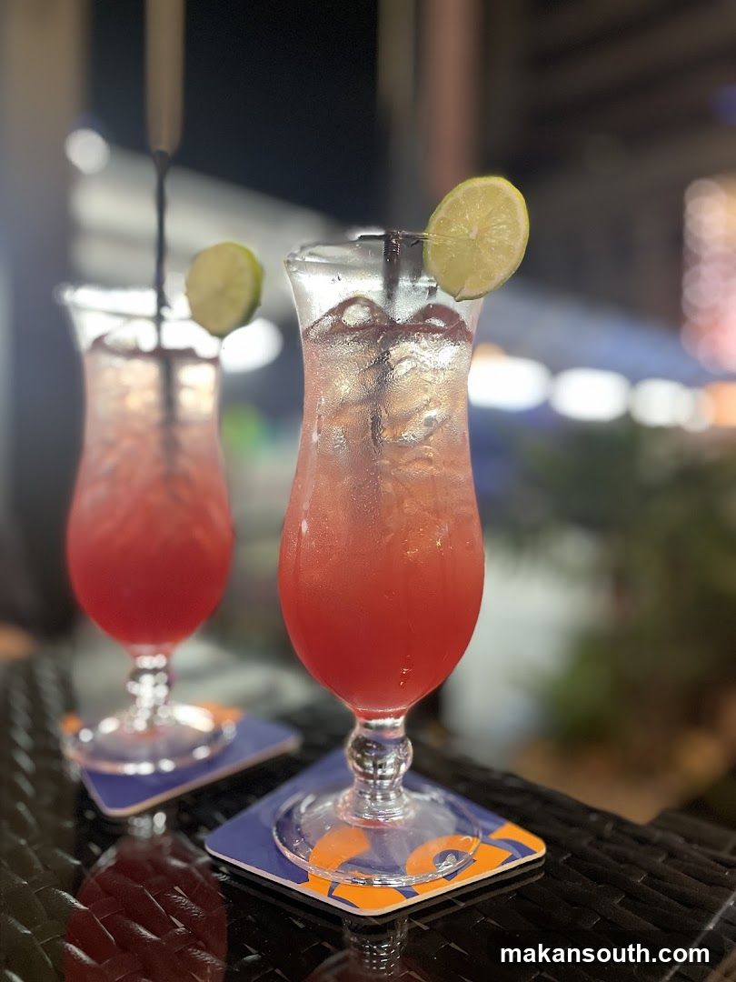 Pink Cocktails with Lime Garnish