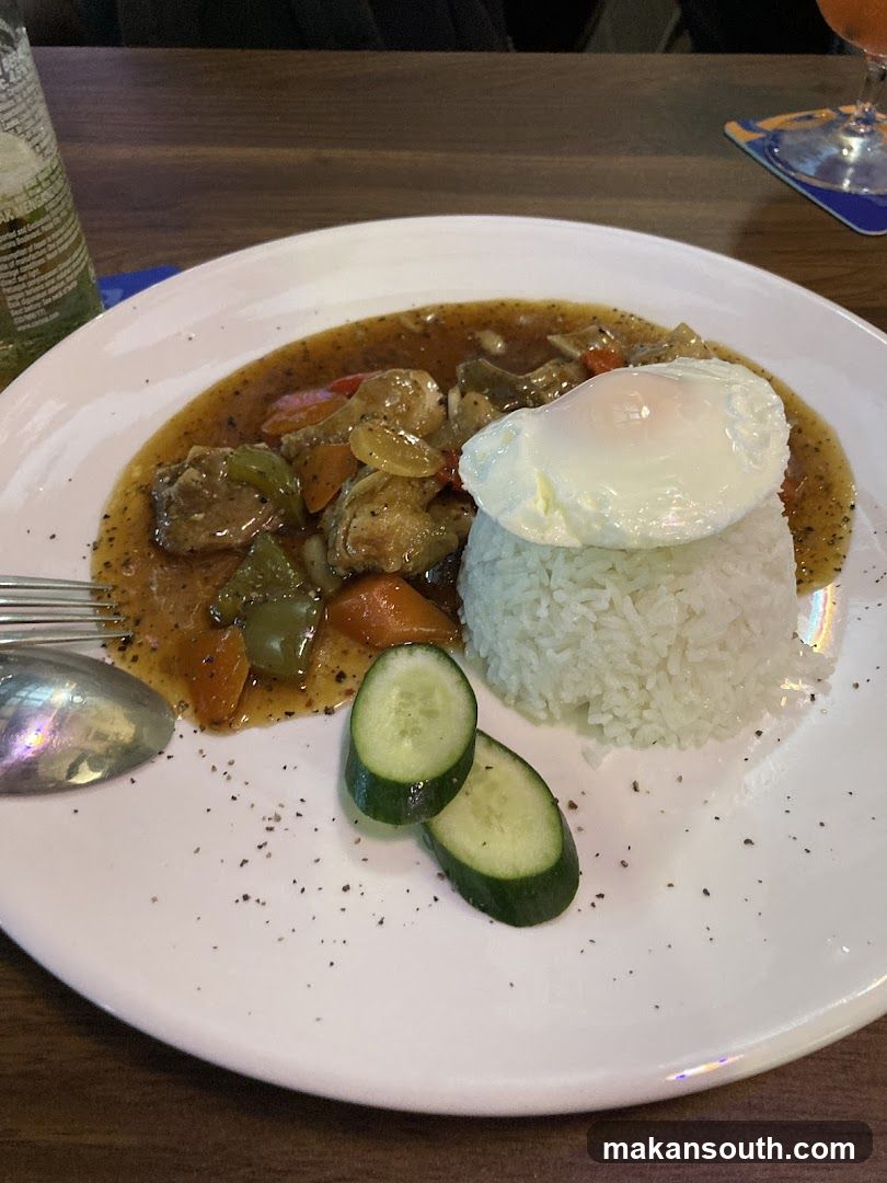 Cauliflower Rice with Fried Egg and Curry Sauce