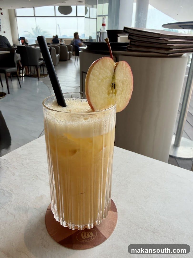 Apple Juice Drink with Sliced Apple Garnish
