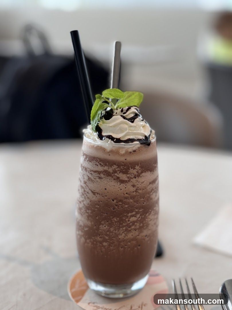 Chocolate Milkshake with Whipped Cream and Mint
