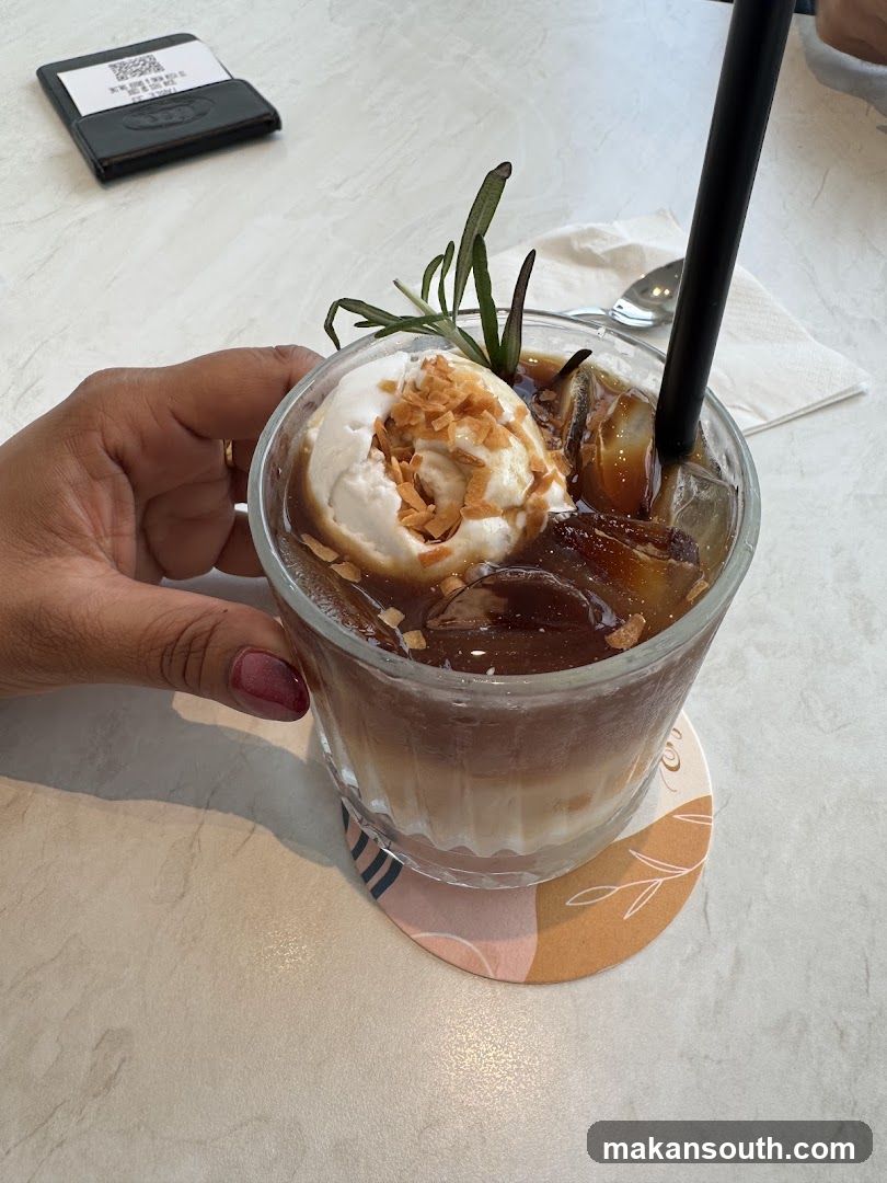 Iced Coffee with Whipped Cream and Rosemary