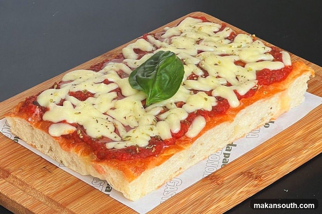 Breadstick Pizza on Wooden Board