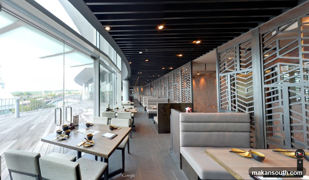 Restaurant Interior with Large Windows and Booth Seating