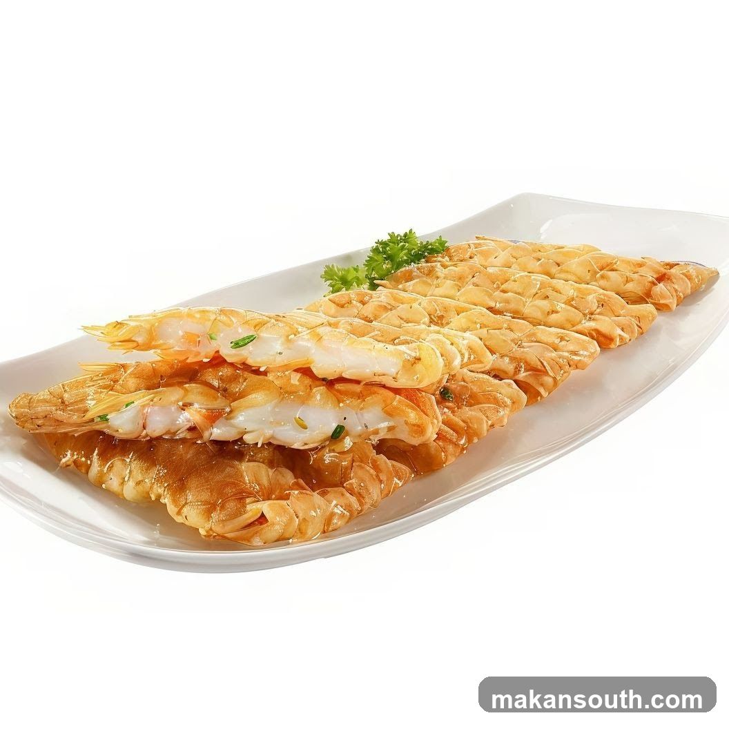 Sliced Lobster Tail on White Plate