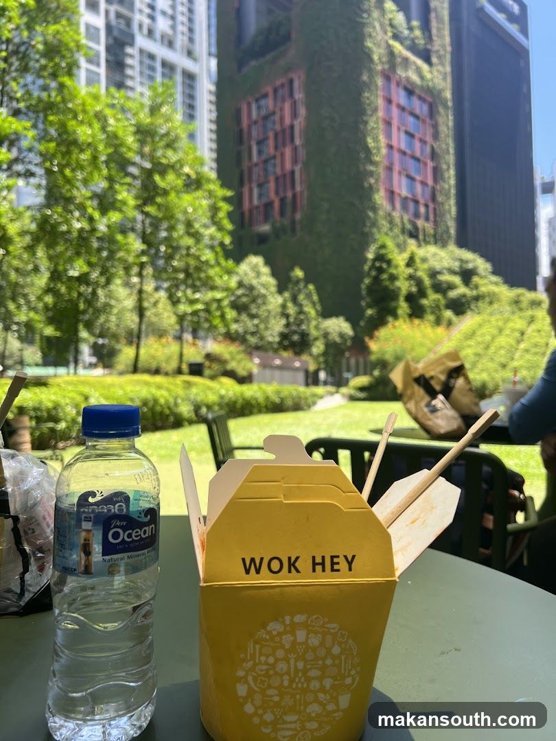Wok Hey Takeout Box on Outdoor Table