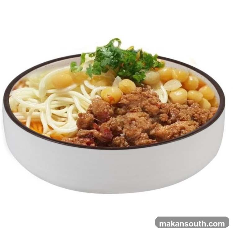 Bowl of Noodles with Meat Sauce and Chickpeas